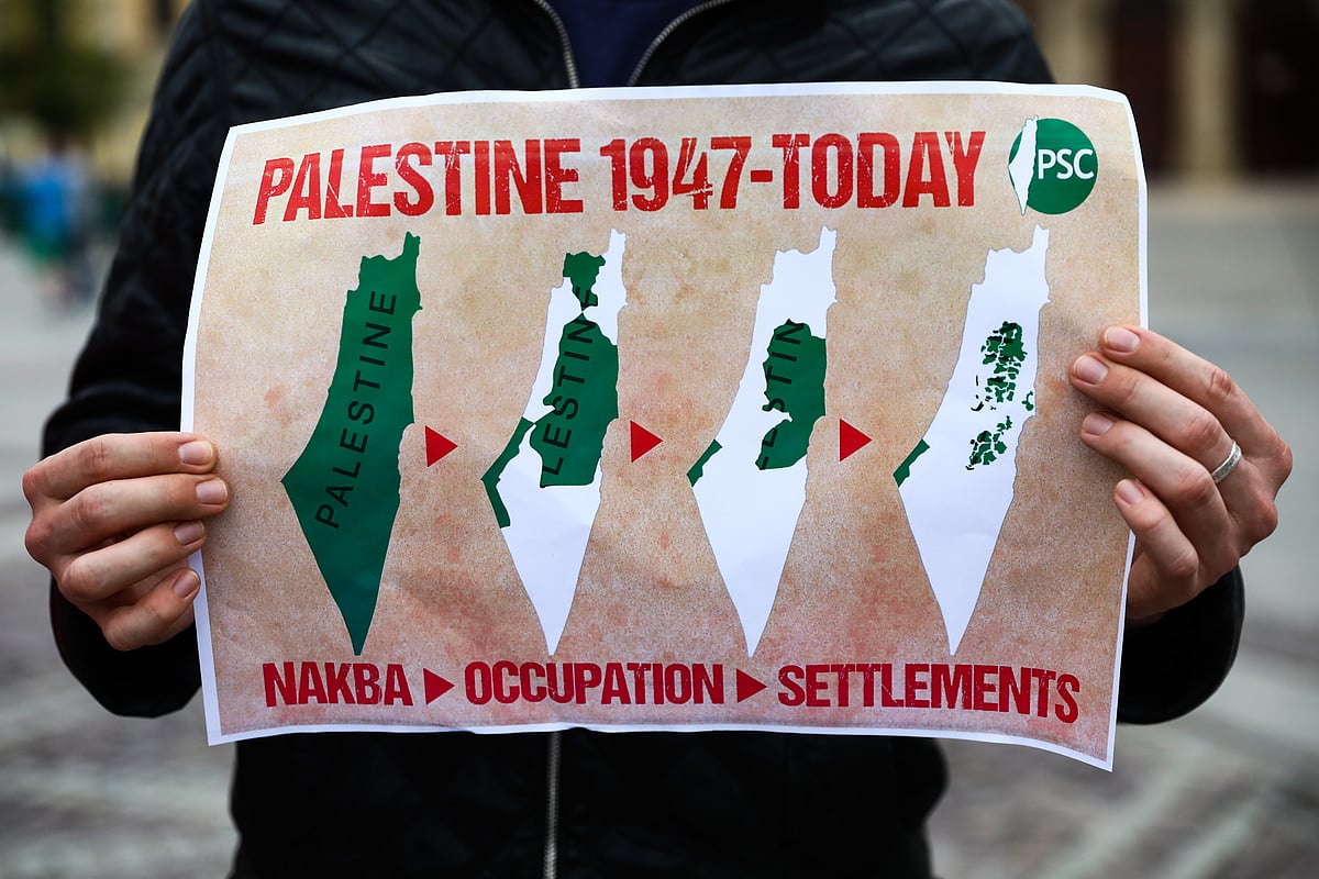 File photo of a protester in Krakow, Poland in May 2021, demanding an end to deadly Israeli attacks on the Gaza strip (photo: Getty Images)