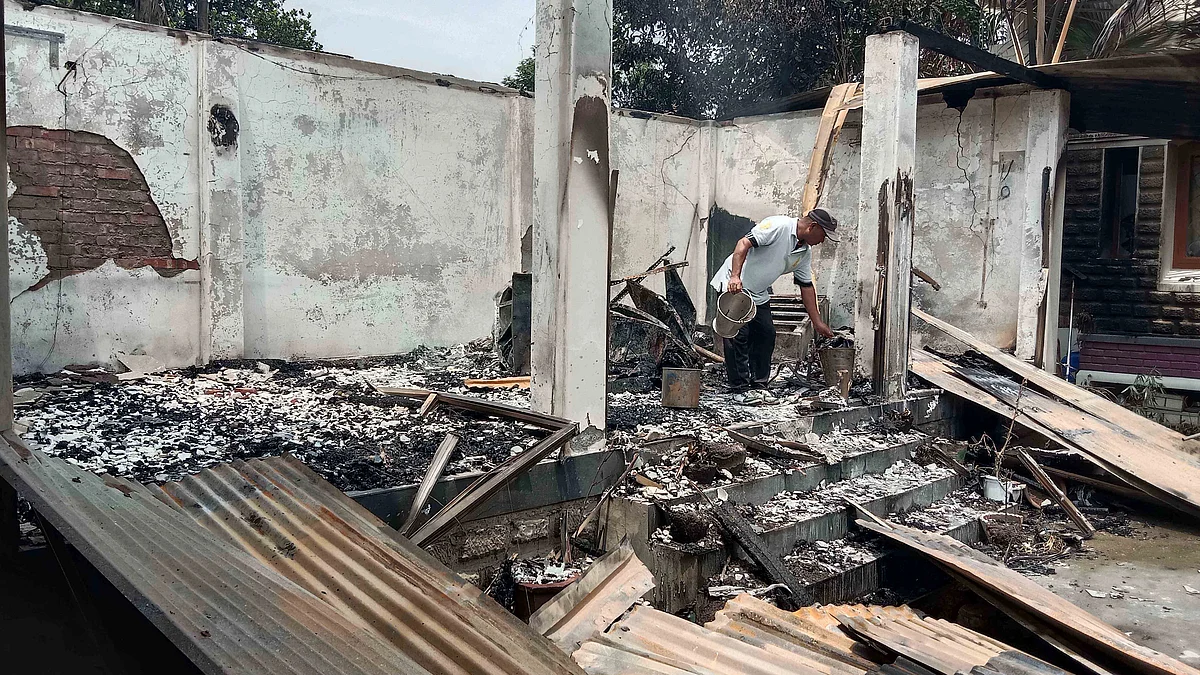 Representative image of a house set on fire in Manipur (Photo: Getty Images)