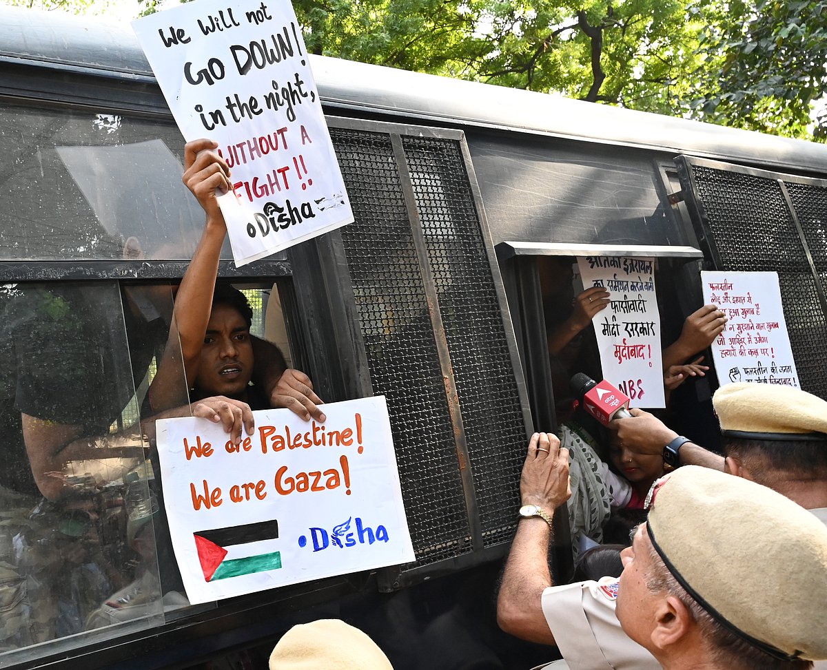 Bundled into a police vehicle, members of a Left-leaning students' organisation protest against Israel at Delhi's Jantar Mantar on 13 October (photo: Getty Images)