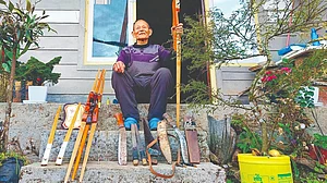 Tshering Dorjee Bhutia at home in Karthok, with his handmade bows and the tools of his craft (photo: Jigyasa Mishra)