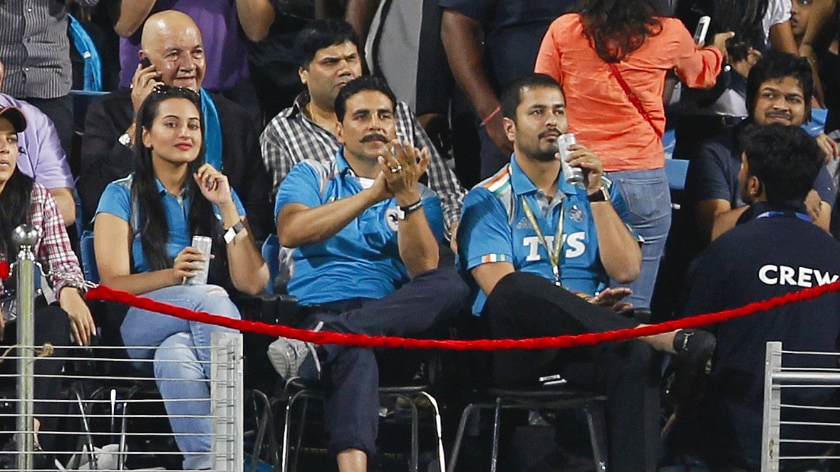 Bollywood stars Sonakshi Sinha, Prem Chopra (behind) and Akshay Kumar at a match between Pune Warriors India and Kolkata Knight Riders at Pune's Subrata Roy Sahara Stadium in 2012 (photo: Getty Images)