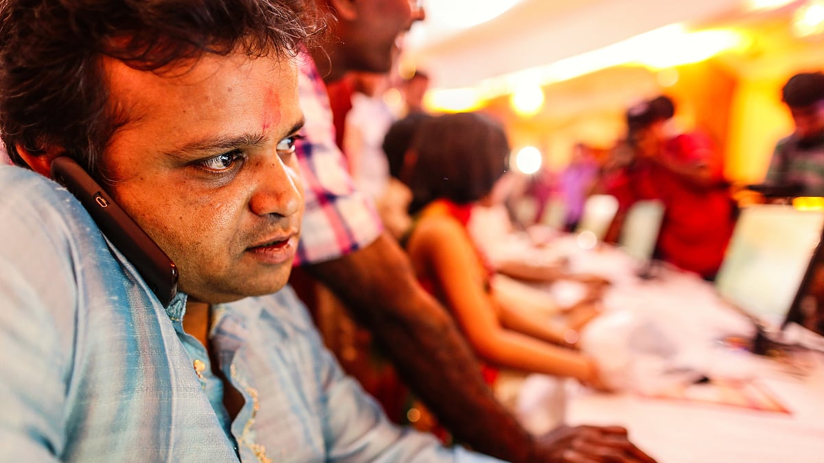 File photo of a broker making a ceremonial purchase of stocks during muhurat trading at the BSE (photo: Getty Images