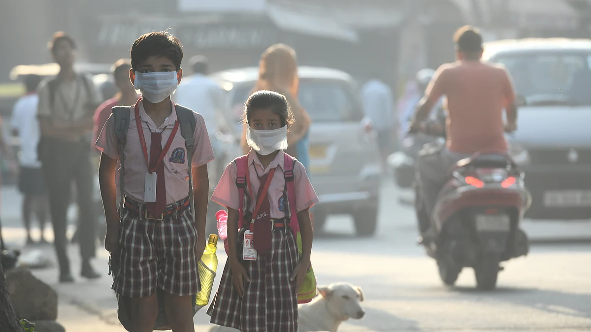 Representative image of masked children in school uniform (photo: Raj K Raj/Hindustan Times via Getty Images)