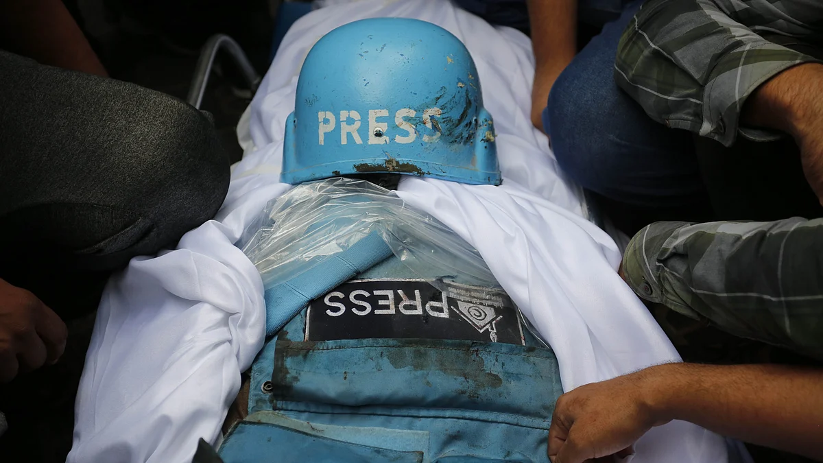 Funeral ceremony held for Palestinian journalists Saeed Al-Taweel and Mohammad Sobh, who were killed in Israeli airstrikes, in Gaza Strip on 10 October.(Photo: Ashraf Amra/Anadolu via Getty Images)