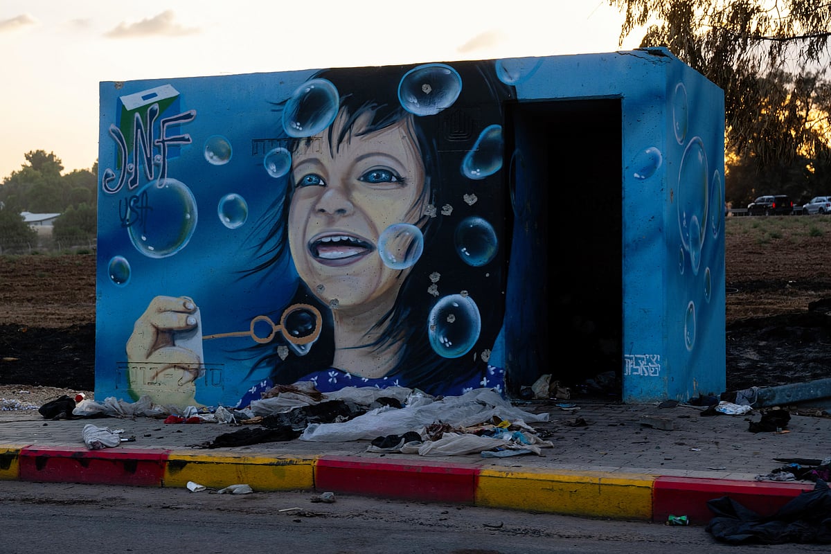 Personal belongings surround a bomb shelter near the spot where hundreds of Israelis were killed in a Hamas attack near the Israel-Gaza border on 7 October (photo: Getty Images)