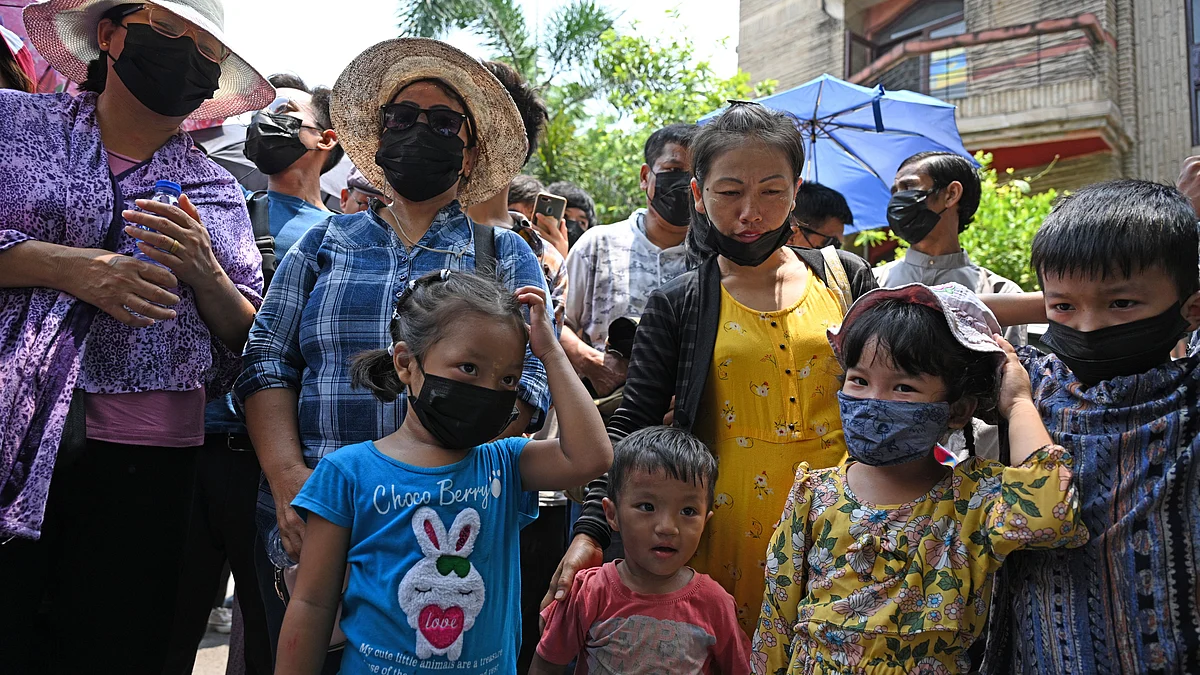 Refugees from Myanmar, including children, at a prayer meeting outside the UNHCR office in New Delhi on the occasion of International Refugee Day, 20 June 2023. (photo: Manish Rajput/ The India Today Group via Getty Images)