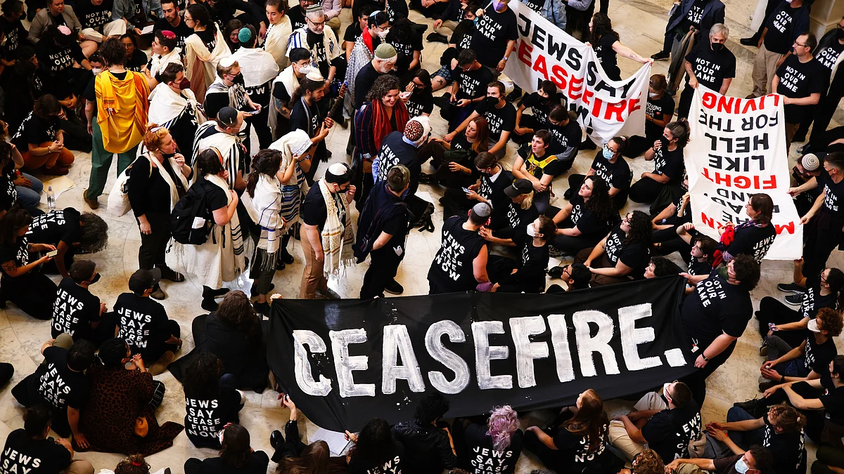 Members of the Jewish Voice for Peace and the IfNotNow movement at a rally calling for a ceasefire in the Israel–Hamas war, in Washington DC (photo: Getty Images)