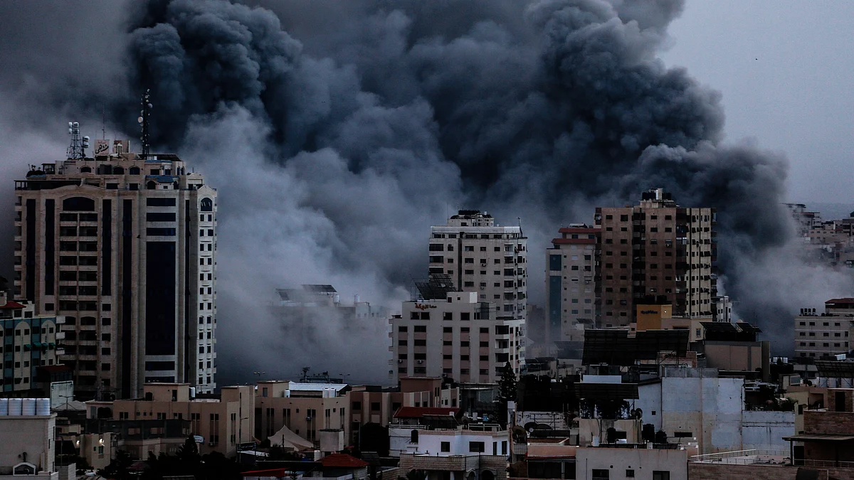 Representative image of smoke rising over buildings in Gaza City on during an Israeli air strike