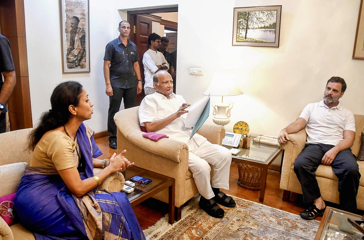 Congress MP Rahul Gandhi meets Sharad Pawar and Supriya Sule at Pawar's Delhi residence (photo: Getty Images)