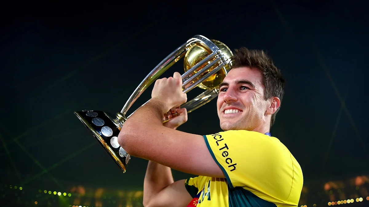 Pat Cummins of Australia poses with the ICC Mens Cricket World Cup Trophy (Photo by Alex Davidson-ICC/ICC via Getty Images)