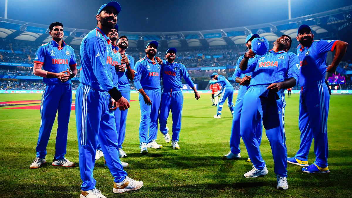 The Indian team enjoys a moment before taking to the field during the India-Sri Lanka World Cup match at Mumbai's Wankhede Stadium on Thursday (photo: Getty Images)