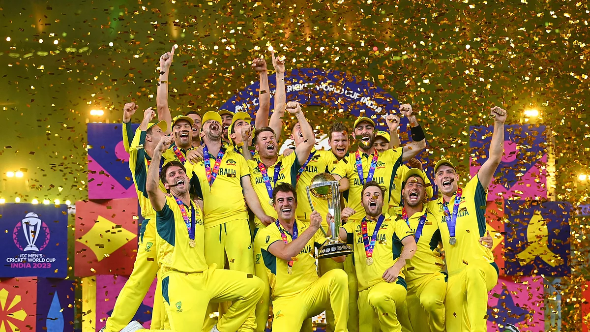 The victorius Australian team with their trophy (Photos courtesy: @ICC/ X)