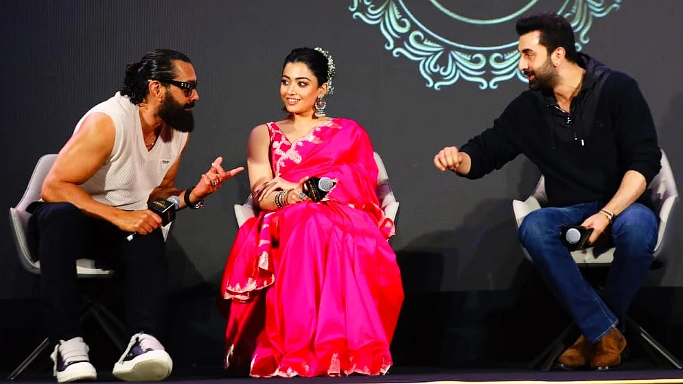 (From left) Actors Bobby Deol, Rashmika Mandanna and Ranbir Kapoor at an event to promote the film (photo: @AnimalTheFilm/X)