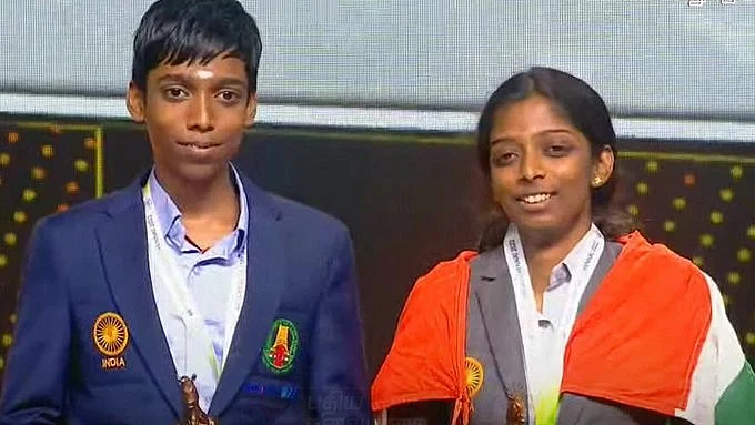 Vaishali Rameshbabu (right) and R. Praggnanandhaa (left) at the award ceremony of the Chess Olympiad in their hometown of Chennai last year (photo: @rpragchess/X)