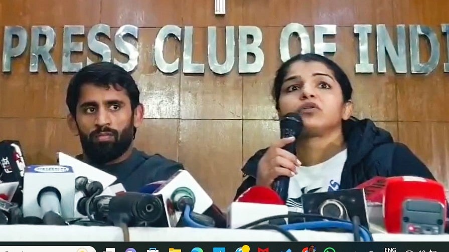 Wrestlers Sakshi Malik and Bajrang Punia at a media conference following the WFI elections (screengrab from @SakshiMalik/X)
