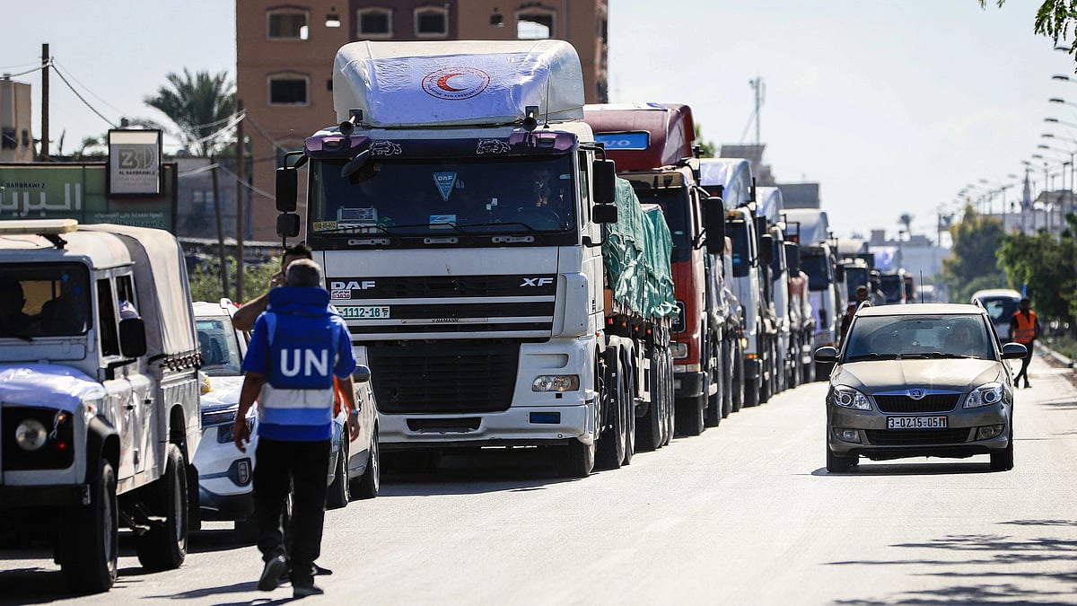 Trucks carrying humanitarian aid head to Deir Al-Balah after crossing from Egypt into the Gaza Strip in Rafah. Currently aid is reaching Gaza strip only through the Rafah border. (photo: Getty Images)