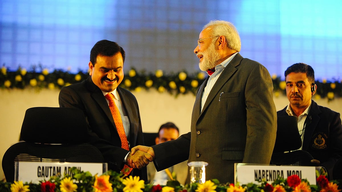 File photo of PM Narendra Modi when he was Gujarat CM, and  Adani Group head Gautam Adani in Gandhinagar (photo: National Herald archive)