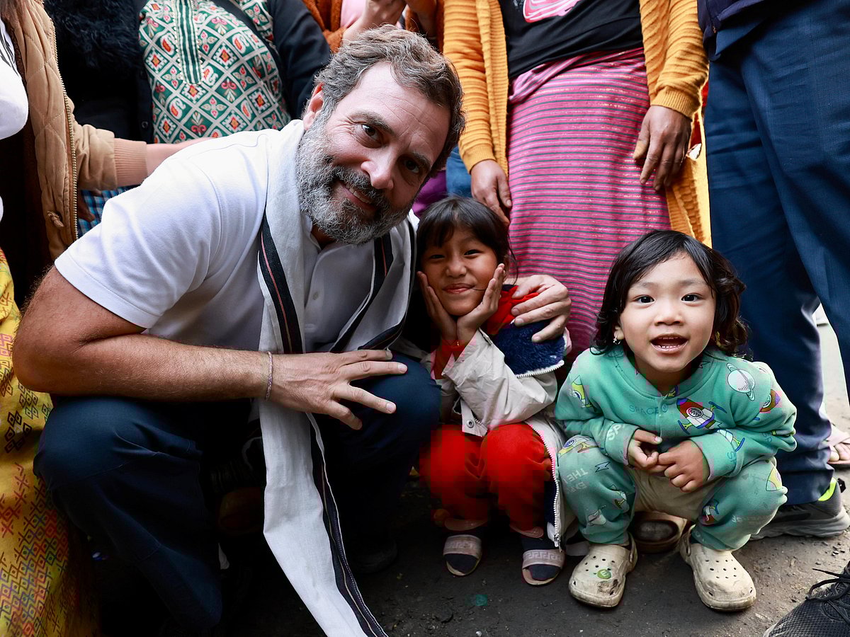 Children greet and cheer the Congress leader on his quest for justice