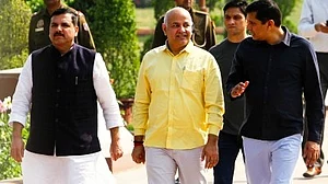 Sanjay Singh (left) and Manish Sisodia (centre)