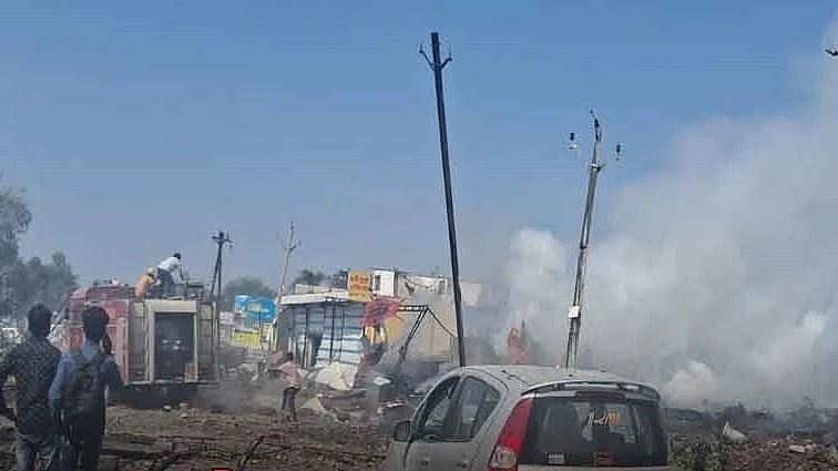 Smoke yet to settle in this fire-devastated village in Harda, Madhya Pradesh, where a fireworks factory blaze injured nearly 200 (photo courtesy @abuasimazmi/X)