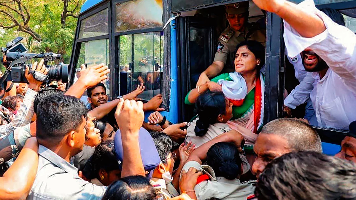 Y.S. Sharmila in a police vehicle at the time of her detention (photo: PTI)