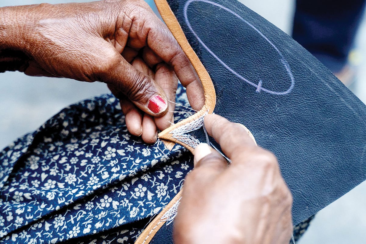 Leather being embroidered