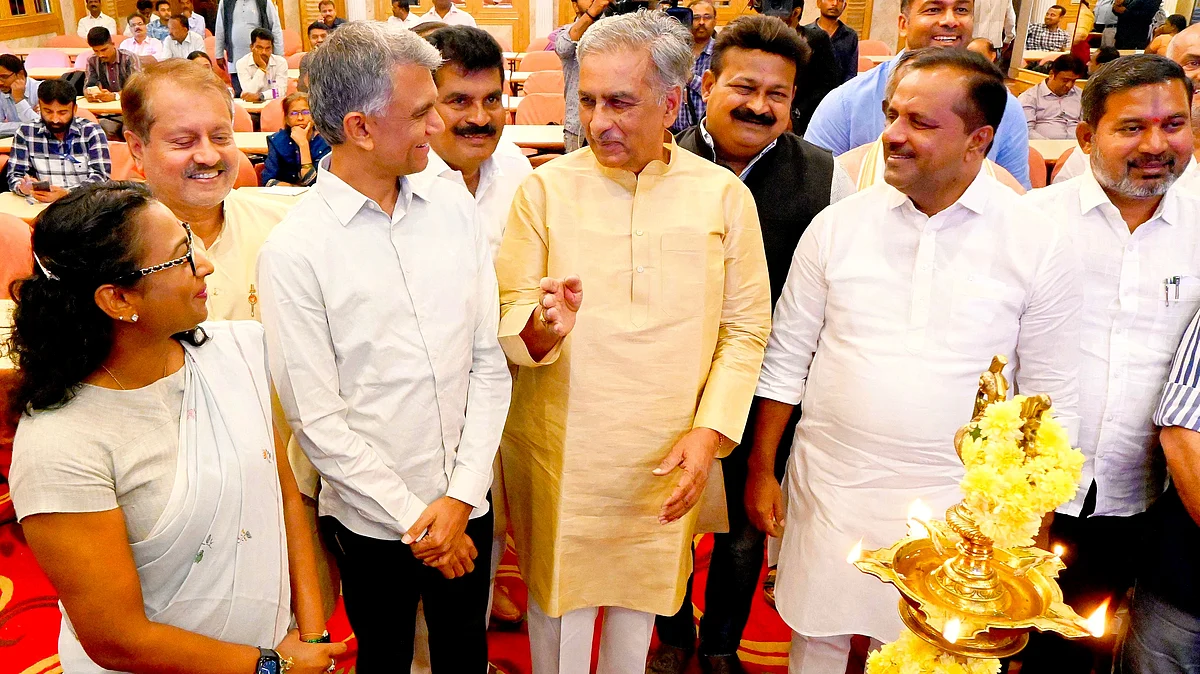 U.T. Khader (second from right) with legislative council chairman Basavaraj Horatti at an orientation programme in Bengaluru