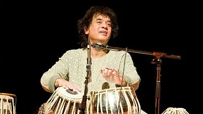 Zakir Hussain was named the Best Global Music Performance for his work in 'Pashto' alongside Bela Fleck and Edgar Meyer, featuring Rakesh Chaurasia (photo: National Herald archives )