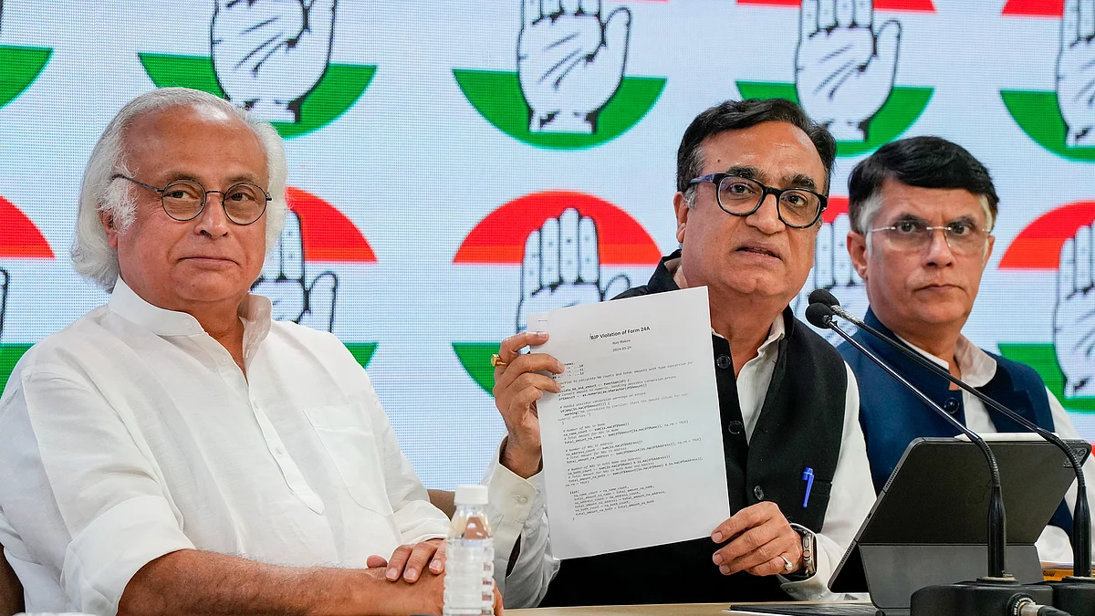 Congress leaders Jairam Ramesh, Ajay Maken and Pawan Khera during a press conference in New Delhi on 29 March (photo: PTI) 