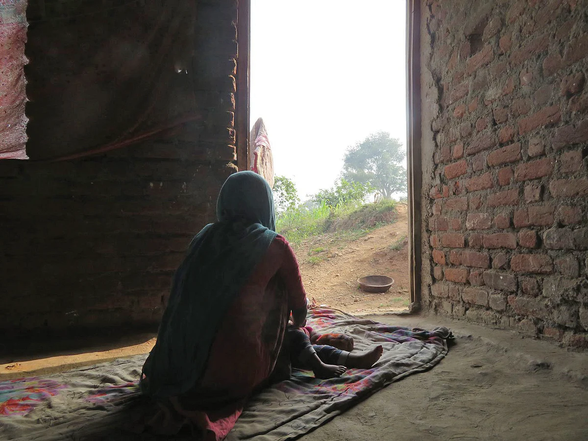 A migrant woman with her child. Women who don’t speak the local language, find it impossible to get help against domestic abuse (photo courtesy PARI)