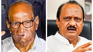 Sharad Pawar (left) and estranged nephew Ajit Pawar