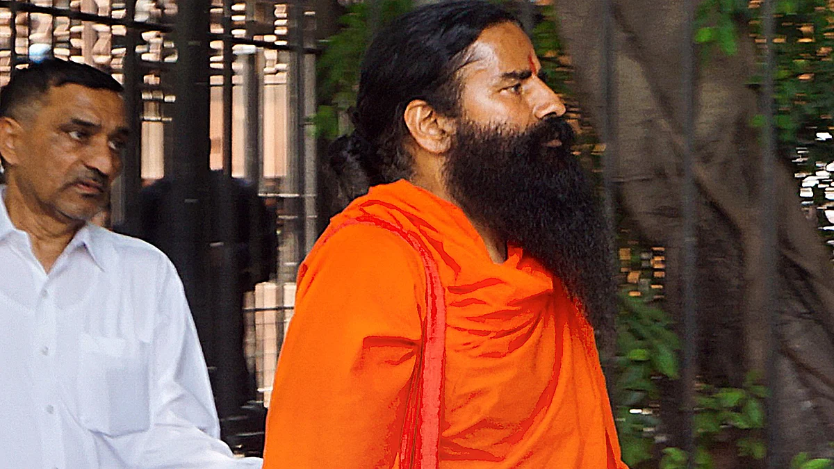 Yoga guru Ramdev leaves after appearing before the Supreme Court in New Delhi on 23 April (photo: PTI)
