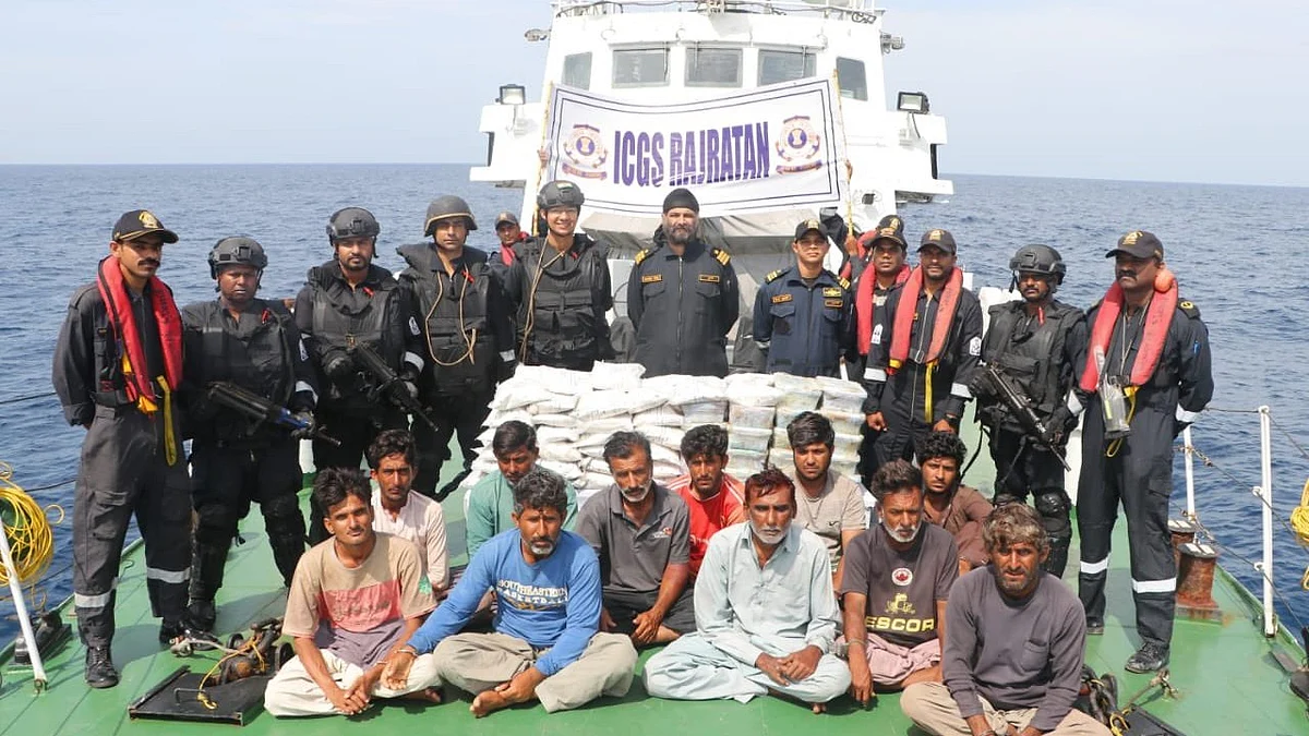 The apprehended Pakistani fishing boat at Porbandar with 14 crew and 86 Kg heroine (Photo: @IndiaCoastGuard)