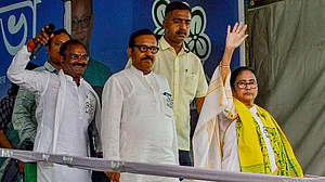 Mamata Banerjee waves at supporters in Cooch Behar in this dated picture