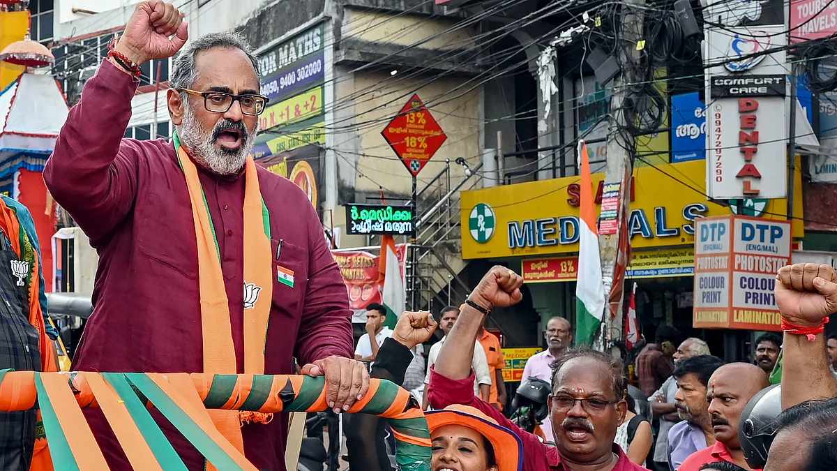 BJP candidate Rajeev Chandrasekhar during a roadshow in Thiruvananthapuram on 8 April (photo: PTI)