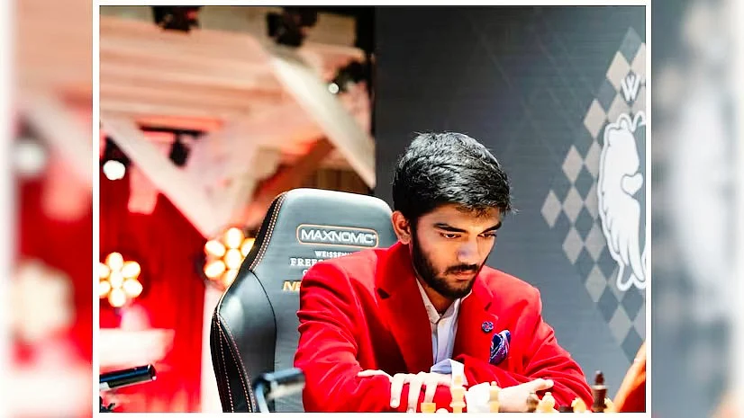 (photo: @DGukesh/X)