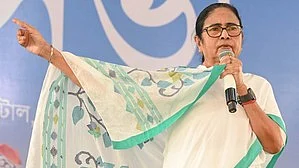 Mamata Banerjee addresses an election rally in Ghatal on 26 April (photo: IANS)