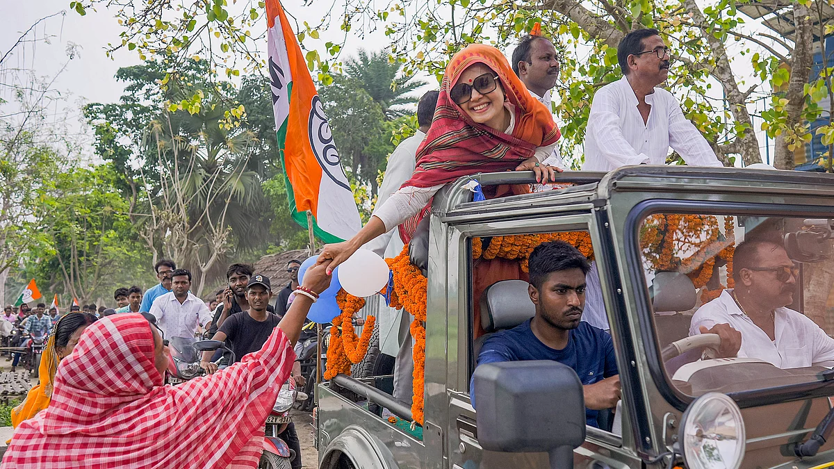Krishnanagar TMC candidate Mahua Moitra at an election campaign rally for Lok Sabha polls at Dhubuliya, in Nadia district, 31 March 31 (photo: PTI)