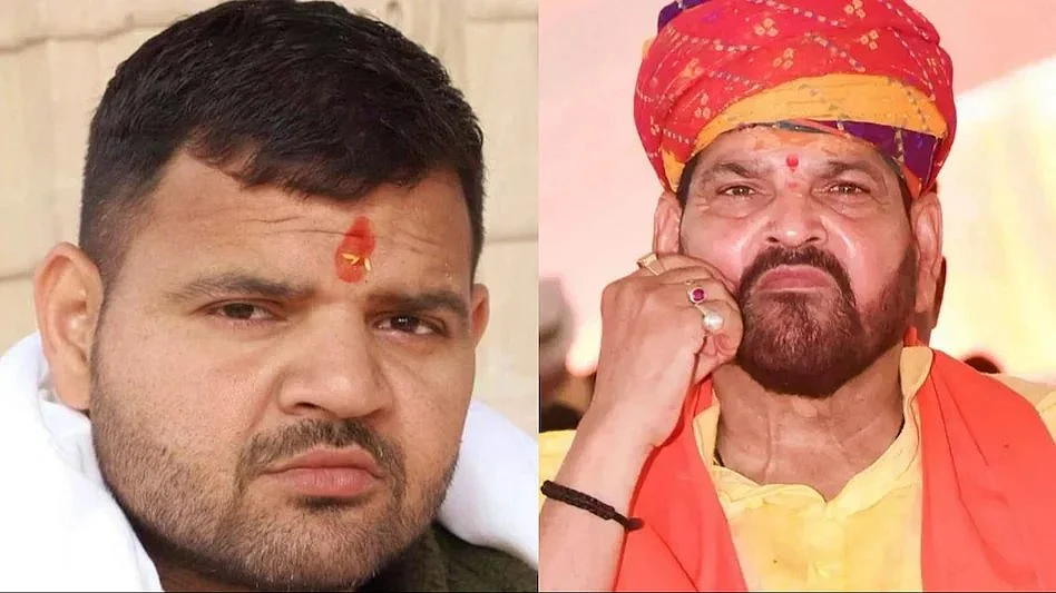 The apple doesn't fall far... Karan (left), son of Brij Bhushan Sharan Singh (photo: @kapsology/X)