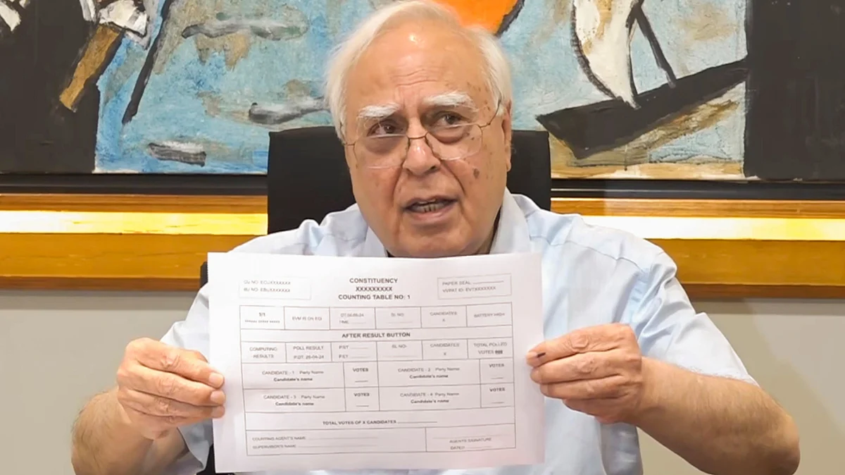 Kapil Sibal at the press meet (photo: PTI)