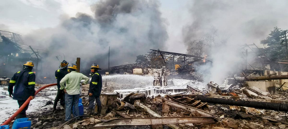 Firefighters at the spot of the boiler blast in a chemicals factory in Dombivli, Thane district (photo: PTI)