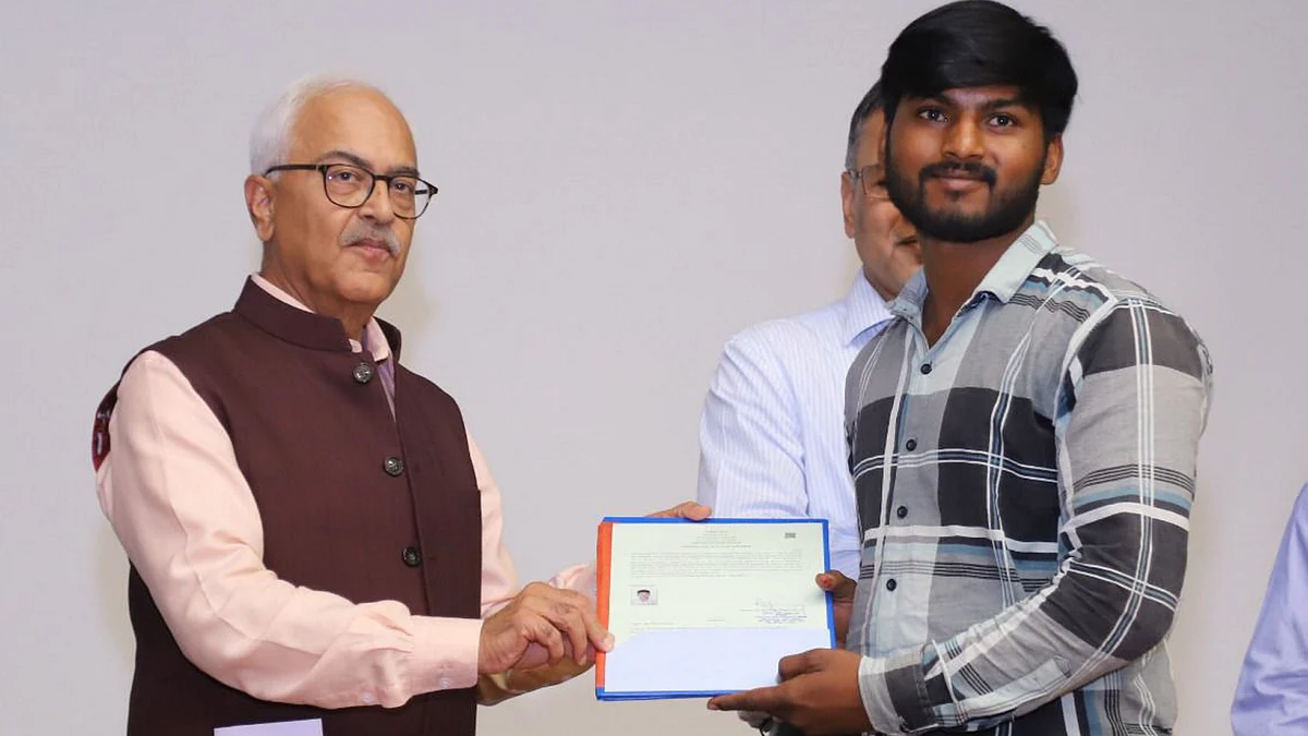 Union home secretary Ajay Kumar Bhalla hands over citizenship certificate under CAA in New Delhi on 15 May (photo: PTI)