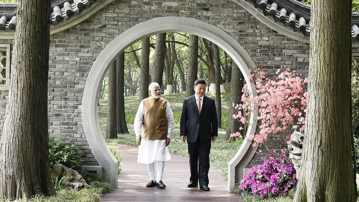 PM Narendra Modi with Chinese President Xi Jinping in Wuhan in 2018 (photo: @PMOIndia/X)