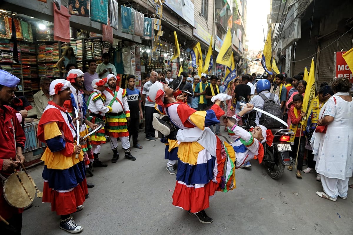 Artistes perform during the roadshow