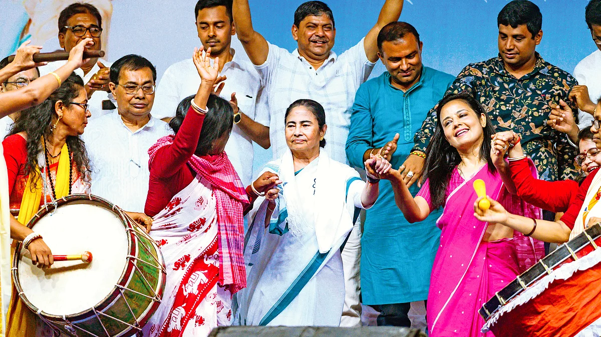 Mamata Banerjee (centre) and TMC candidate Mahua Moitra (far right) at a Matua community meet in Betai, Nadia district