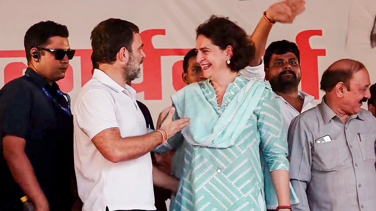 Rahul Gandhi (in white), Priyanka Gandhi Vadra are jubilant in Rae Bareli (photo: PTI)