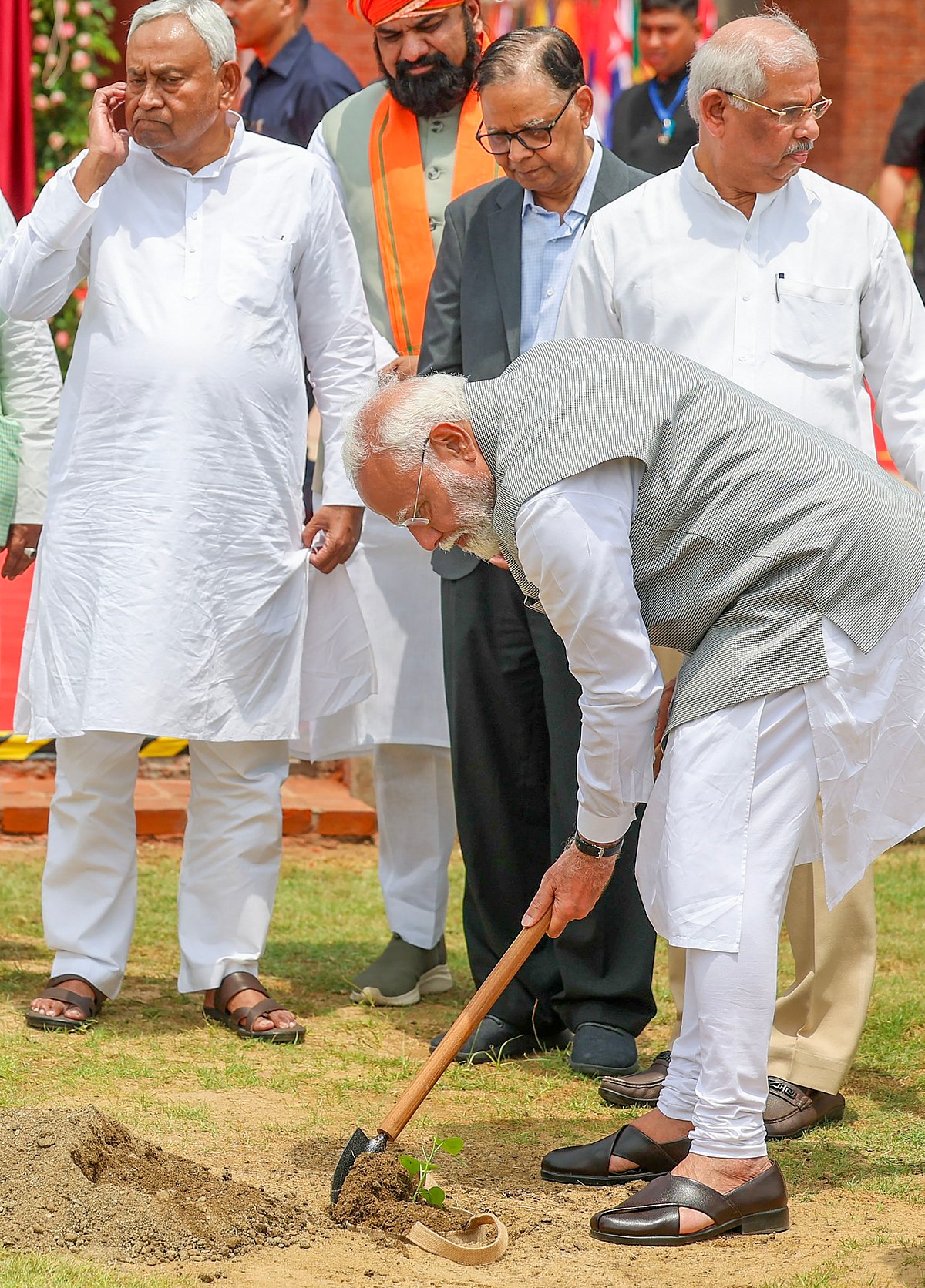 PM Modi plants a sapling at the inauguration of Nalanda University (photo: PTI)