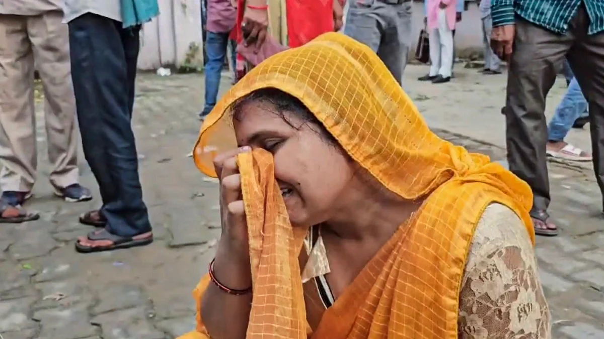 A relative outside a Trauma Centre where victims of the Hathras' stampede were admitted (photo: PTI)