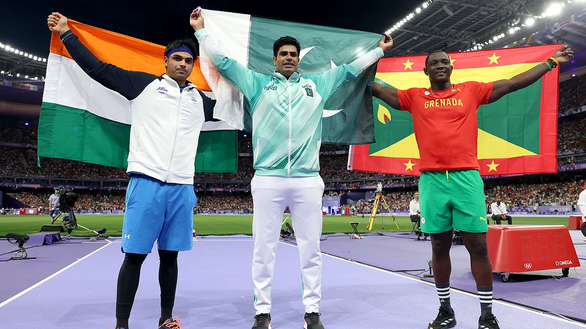 Javelin medallists Arshad Nadeem (centre), Neeraj Chopra (left), Anderson Peters