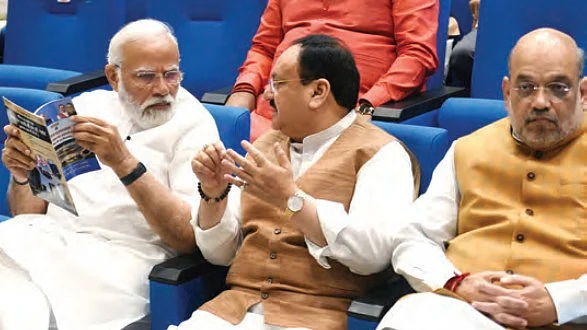 (L-R) PM Narendra Modi, BJP president JP Nadda and home minister Amit Shah